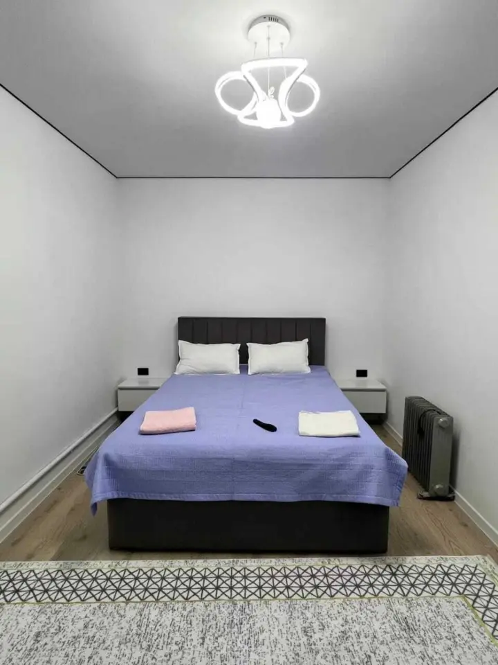 Трехместный номер в Novamotel — room, Karakol