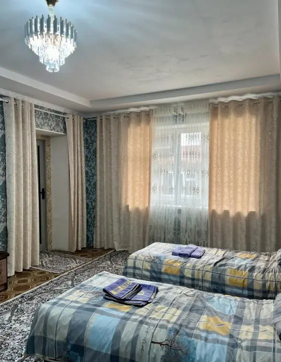 Двухместный номер в October Guest House — room, Suzak
