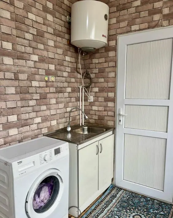 Четырехместный номер в October Guesthouse — room, Suzak