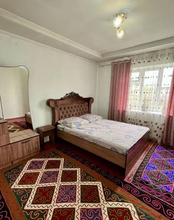 Семейный номер в October Guesthouse — room, Suzak