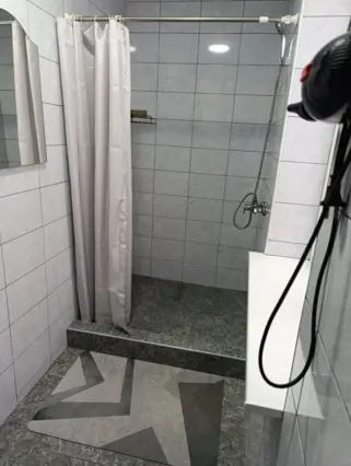 Double (Family) Room — room, Karakol