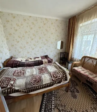 Bed in a Dormitory Room — bed space, v. Tamga