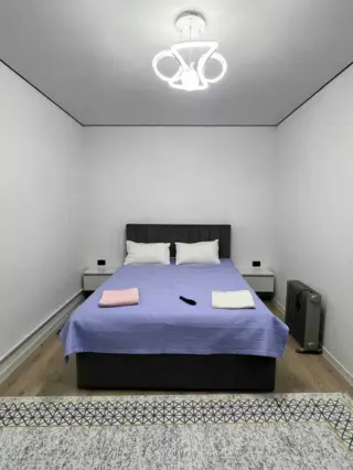 Трехместный номер в Novamotel — room, Karakol