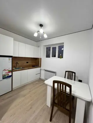 Трехместный номер в Novamotel — room, Karakol