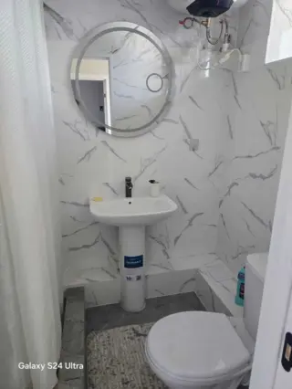 Трехместный номер в Novamotel — room, Karakol