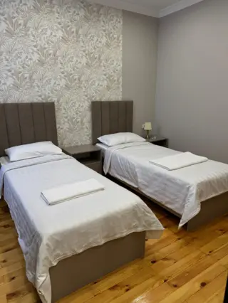Double Deluxe Room at 002 Hotel — room, Osh