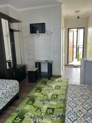 Chambre double avec lits jumeaux — chambre, Bosteri