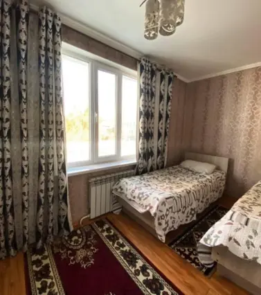 Bed in a Dormitory Room — bed space, Karakol
